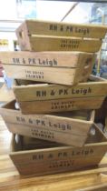 A set of five wooden storage boxes