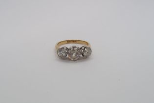 An 18ct yellow gold and platinum three stone diamond ring - diamond weight approx 2.25ct, centre