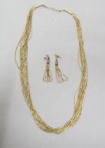 A 14ct (hallmarked)yellow gold twenty strand 'Liquid Gold' necklace - 59cm - approx weight 36.4