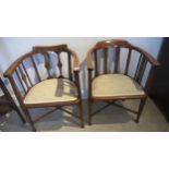 A pair of Edwardian mahogany and satinwood line inlaid upholstered bow back armchairs - good