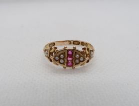 A Victorian 15ct yellow gold (hallmarked) ring with rubies and pearls - ring size R - weight