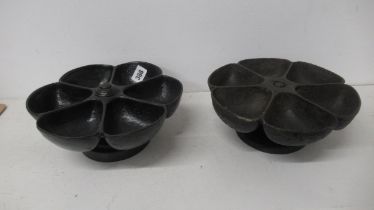 Two cobblers cast iron nail holders
