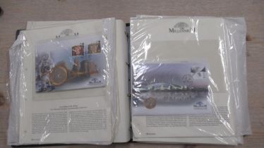 An album of Royal Mail millennium coin covers (11) together with a quantity of Royal Mail FDCs and