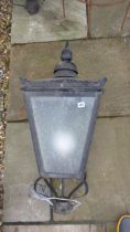 A 19th century style iron and tin lamp post top