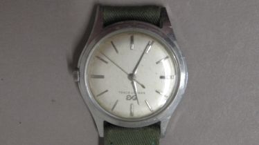 ERNEST BOREL. stainless steel 17 jewel manual wind. 33mm. Slightly aged dial with applied batons and