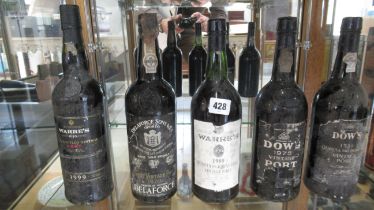 Five bottles of Port including two Dow's 1986 and 1975 two Warre's 1989 and 1999 and Delaforce 1970