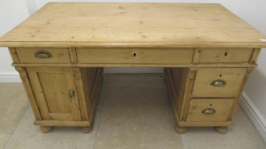 An early 20th century continental pine desk - 143cm wide x 77cm deep x 74cm high