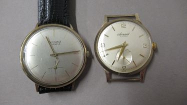 Two gents 9ct gold cased Accurist wristwatches - one with seconds sub dial - case 33mm - working