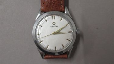 A 1950's gents Omega manual wind wristwatch - steel case - approx 34mm - engraved back dated