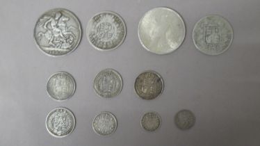 11 silver coins including 1897 crown and 1922 USA Peace dollar