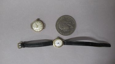 Two ladies 9ct chased wrist watches and a 1935 Crown