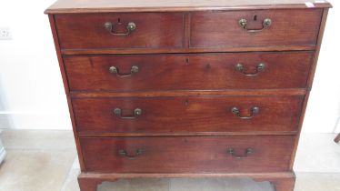 A Georgian mahogany chest of drawers with brass swan neck handles, splits in two for easy removal,