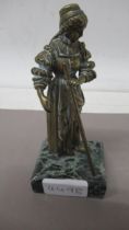 A small bronze figure of a lady on green marble base - 14cm