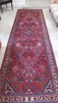 A handmade Meimah rug - 3.98cm x 1.85cm