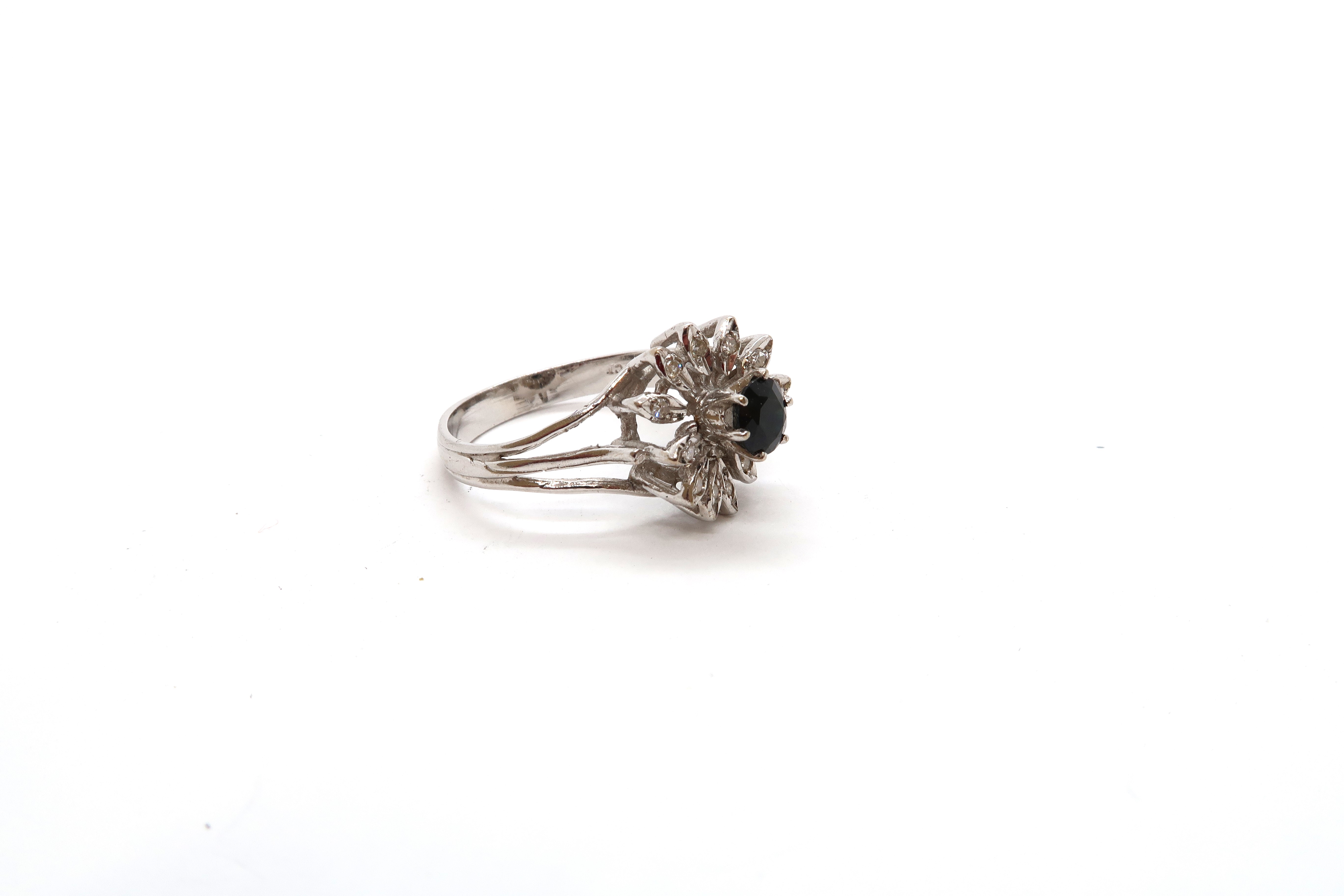 An 18ct white gold hallmarked sapphire and diamond flower cluster ring, size L/M, approx 3.9 grams - Image 2 of 5