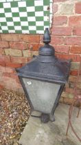 A 19th century style iron and tin lamp post top