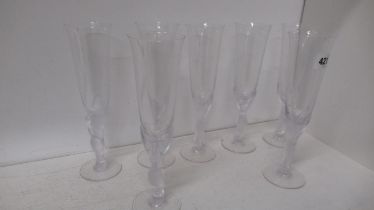 Seven Igor Carl Faberge champagne flutes - all in good condition - with frosted stems