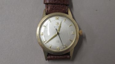 A gents 9ct gold cased Cyma Watersport manual wind wristwatch - case approx 33mm - working in the