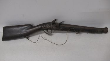 A steel barrel flintlock Blunderbuss, brass inlay to barrel (38cm) lock working, overall length 73cm