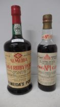 A bottle of 1964 Almeida Ruby Port and a bottle of Pimm's No1 Cup