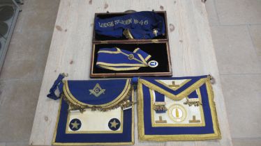 Two Masonic aprons and two sashes