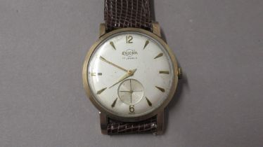 A gents 9ct cased Enicar manual wind wristwatch with seconds sub dial - case 34mm - working in the