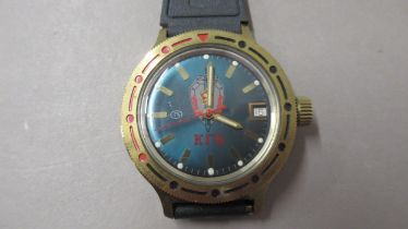 A Soviet KGB automatic wristwatch, rotating bezel, blue dial with date aperture - case 39mm -