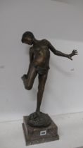 A bronze figure of a boy with crab signed Delotto - Annibale De Lotto - good patina on square grey