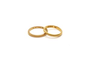 Two 22ct hallmarked yellow gold wedding bands, sizes M and L, approx 6 grams