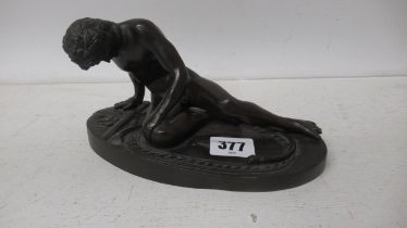 A bronze figure - 19cm x 10cm x 9cm approx