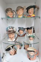 Twelve Royal Doulton Toby jugs