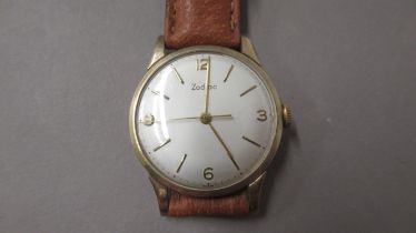 A gents 9ct cased Zodiac manual wind wristwatch - case approx 35mm - back engraved dated 1961 -
