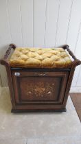 An Edwardian mahogany and inlaid music stool with a fall front