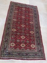 A hand knotted woollen Veramin rug - 1.94m x 1.00m