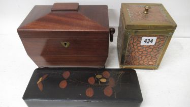 An Arts & Crafts copper and brass tea caddy - 14cm x 10cm - together with a sarcophagus shape