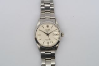 A 1959 Rolex Oyster perpetual date chronometer wristwatch, with original riveted Rolex bracelet,