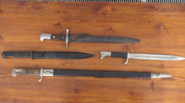 Four Mauser type bayonets, blades 24cm - 52cm