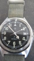 A gents auto Military style watch with nylon strap, date - working in the saleroom - case size 40mm