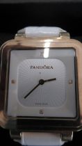 A Pandora watch, white face with gold plated case - 32mm crown on leather strap - working i