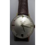 A gents Swissam manual wind watch on brown leather strap - working in the saleroom - case size 34mm