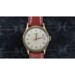 A Smiths Empire manual wind Gents watch on a leather strap, working in saleroom