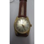 A gents Onsa auto with date and second hand on brown leather strap - working in the saleroom -