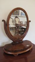 A 19th century mahogany oval dressing table mirror - Height 65cm
