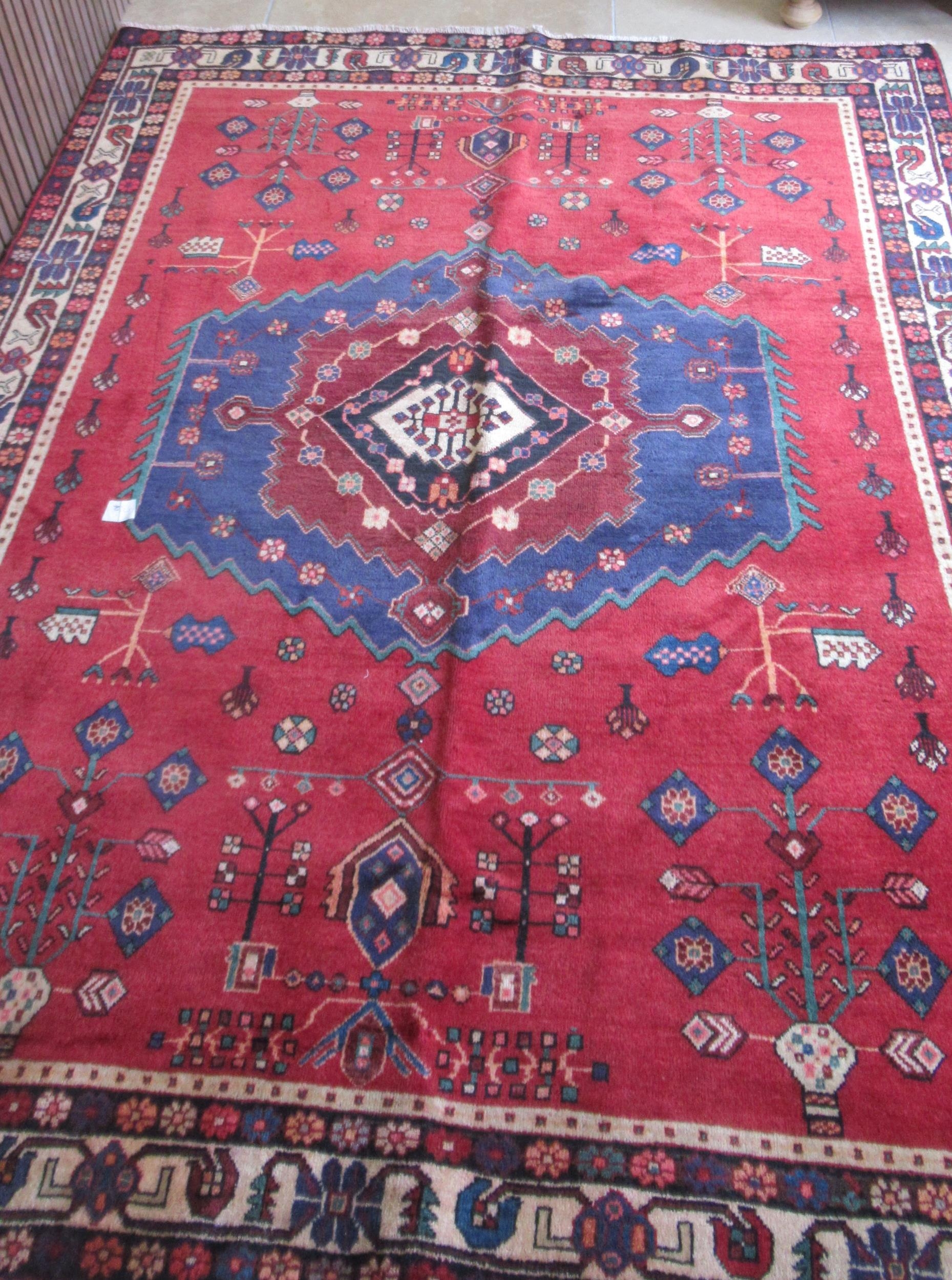 A hand knotted woollen Afshar rug - 2.23m x 1.70m