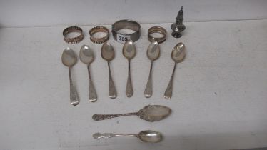 Eight silver spoons, a silver bracelet, pepper mill and three napkin rings, approx 6.8 troy oz