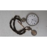 A silver cased open face pocket watch 5cm diameter, ticking together with cord with chain with T bar