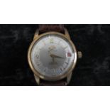 An Enicar Gents automatic wristwatch on a leather strap, working in saleroom