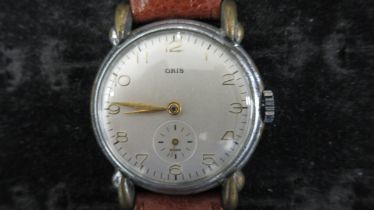 An Oris Gents wristwatch with second hand on a leather strap, working in saleroom
