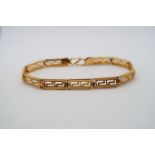 A 22ct (hallmarked) yellow gold articulated bracelet - 21cm - weight approx 18.7 grams