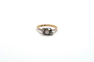 An 18ct and platinum (hallmarked) diamond trilogy ring size P - weight approx 2.9 grams - in